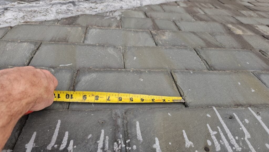 Close-up of cap nails on aging DC mansard roof