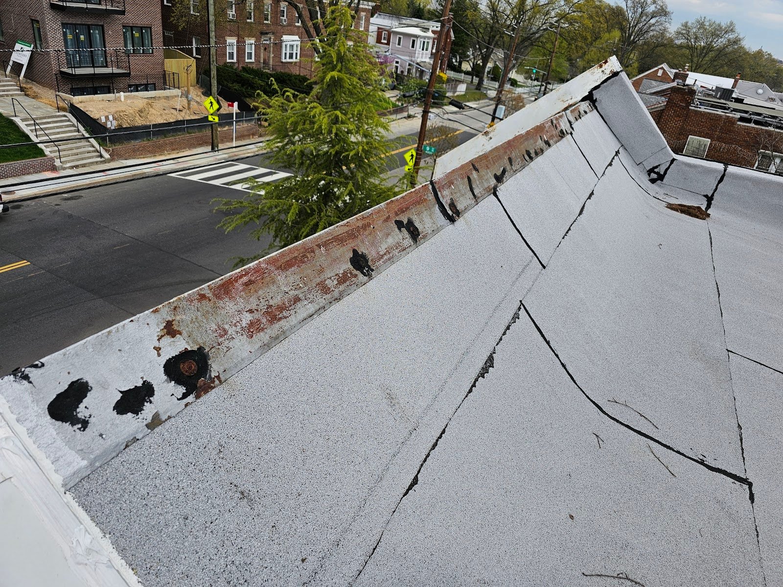 Exposed Cap Nails at a Mansard Ridge