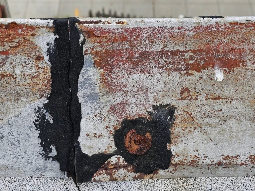 Improperly fastened cap nails at a mansard ridge in Washington, DC