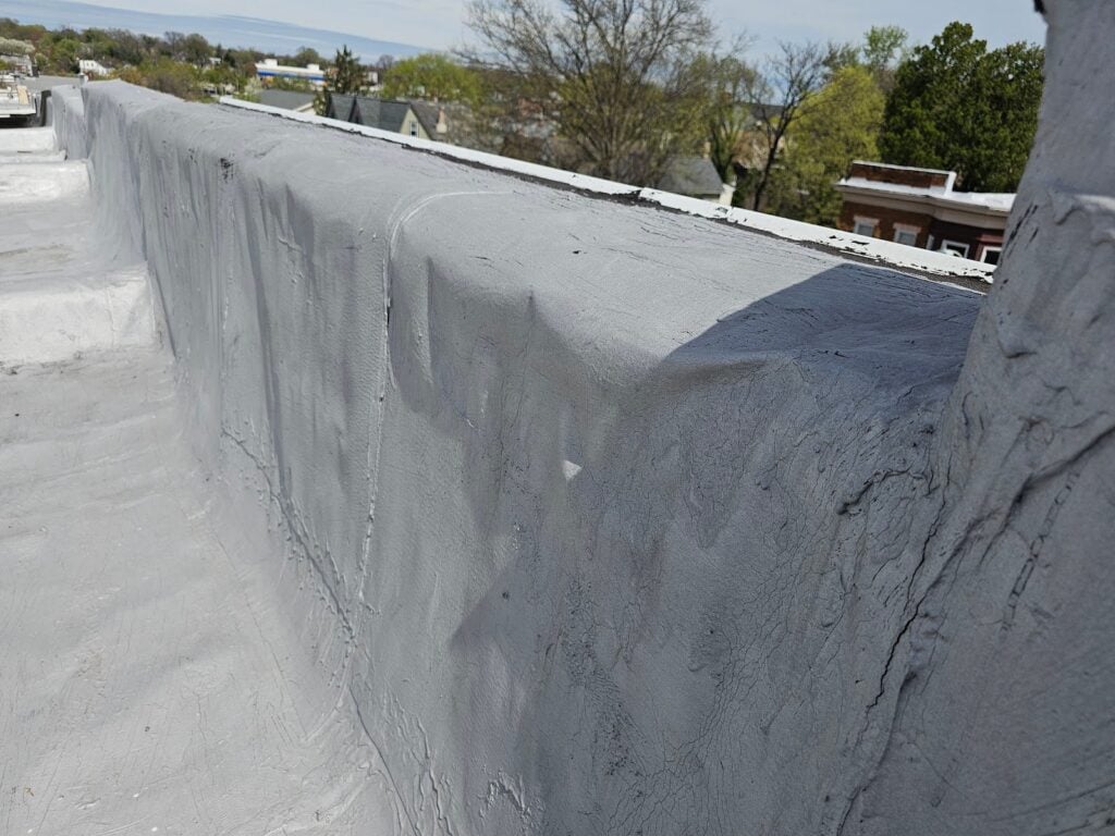 the sides of the low slope roof framing system