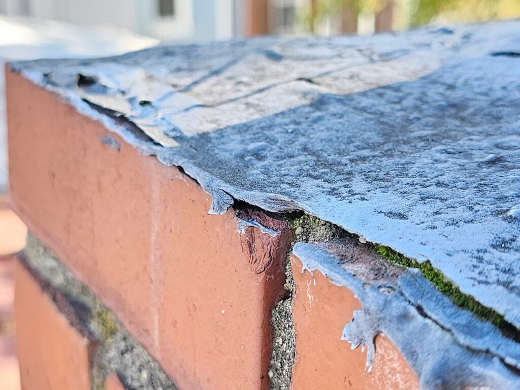 Rooftop chimney flues before repair in Washington, DC