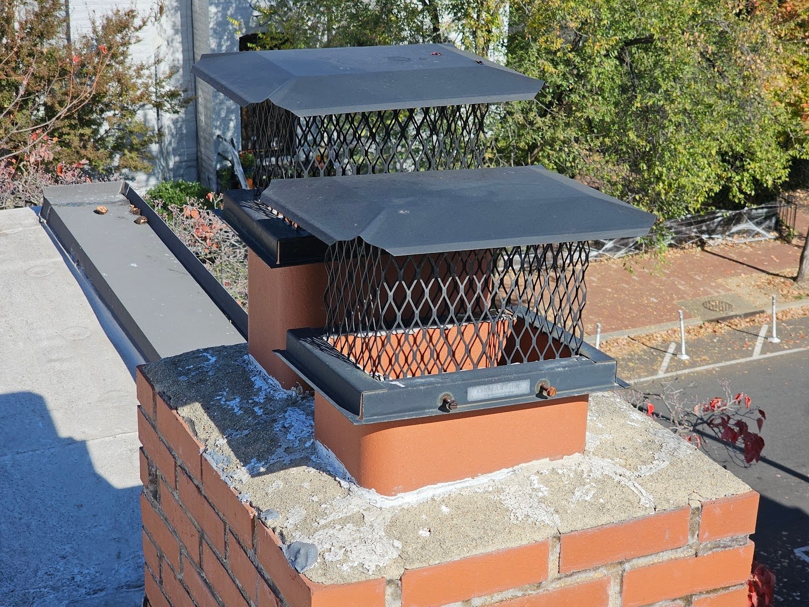 Uncovered Rooftop Chimney Flues