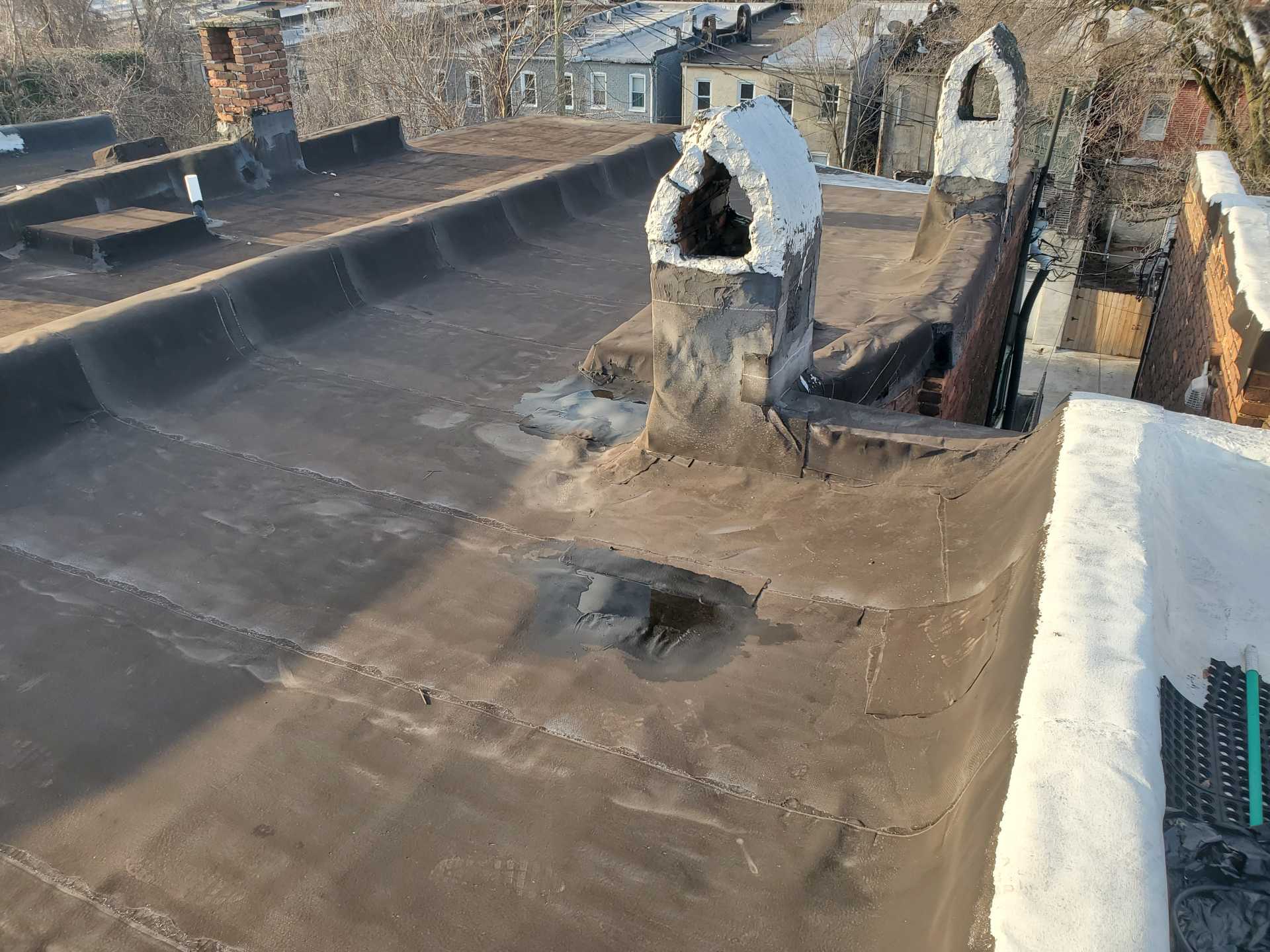 TPO flat roof repair in Capitol Hill DC commercial building using heat welding