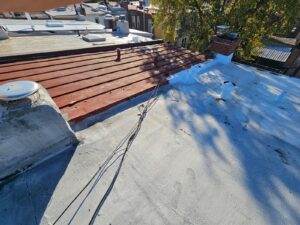 Home 19 Cabling dangled across old rooftop buildings