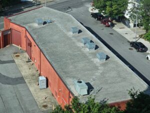 Home 18 Close-up of Built Up Roof layers with stone ballast