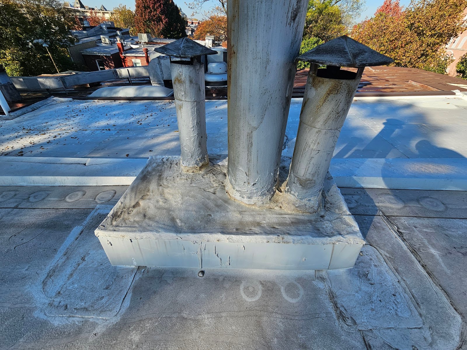 Close-up of metal roof flashing with advanced sealing system