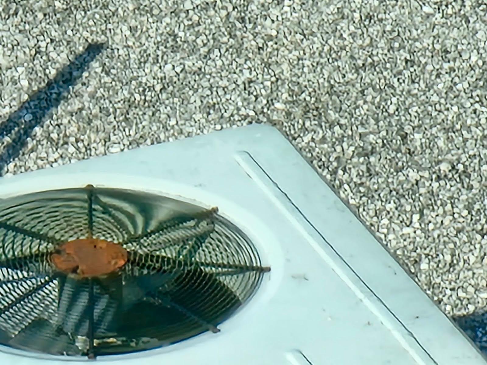 Old Built Up Roof with Ballast - Part I 4 Maintenance work being performed on a Built Up Roof with ballast