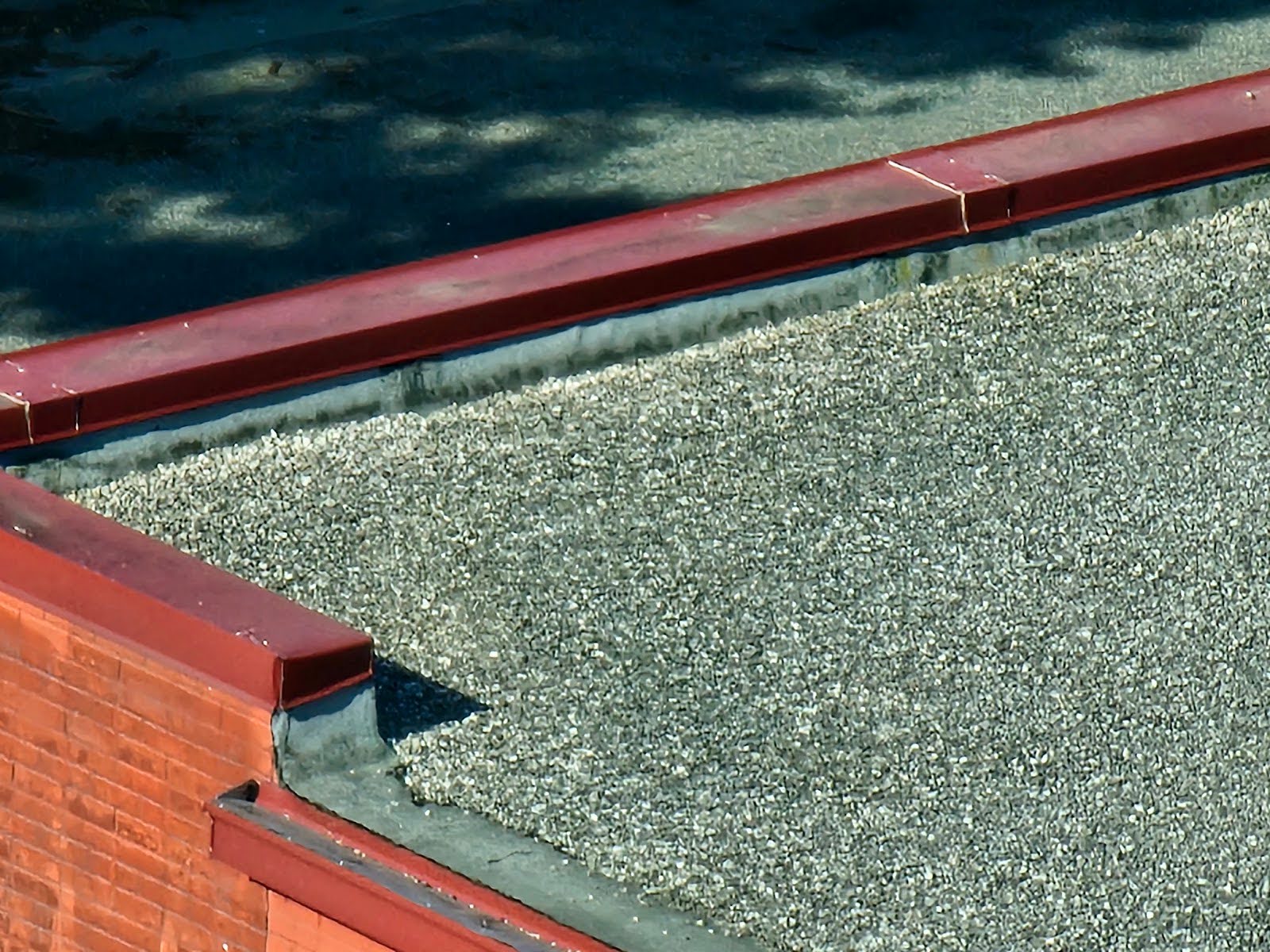 Old Built Up Roof with Ballast - Part I 2 Old Built Up Roof showing weathered gravel surface