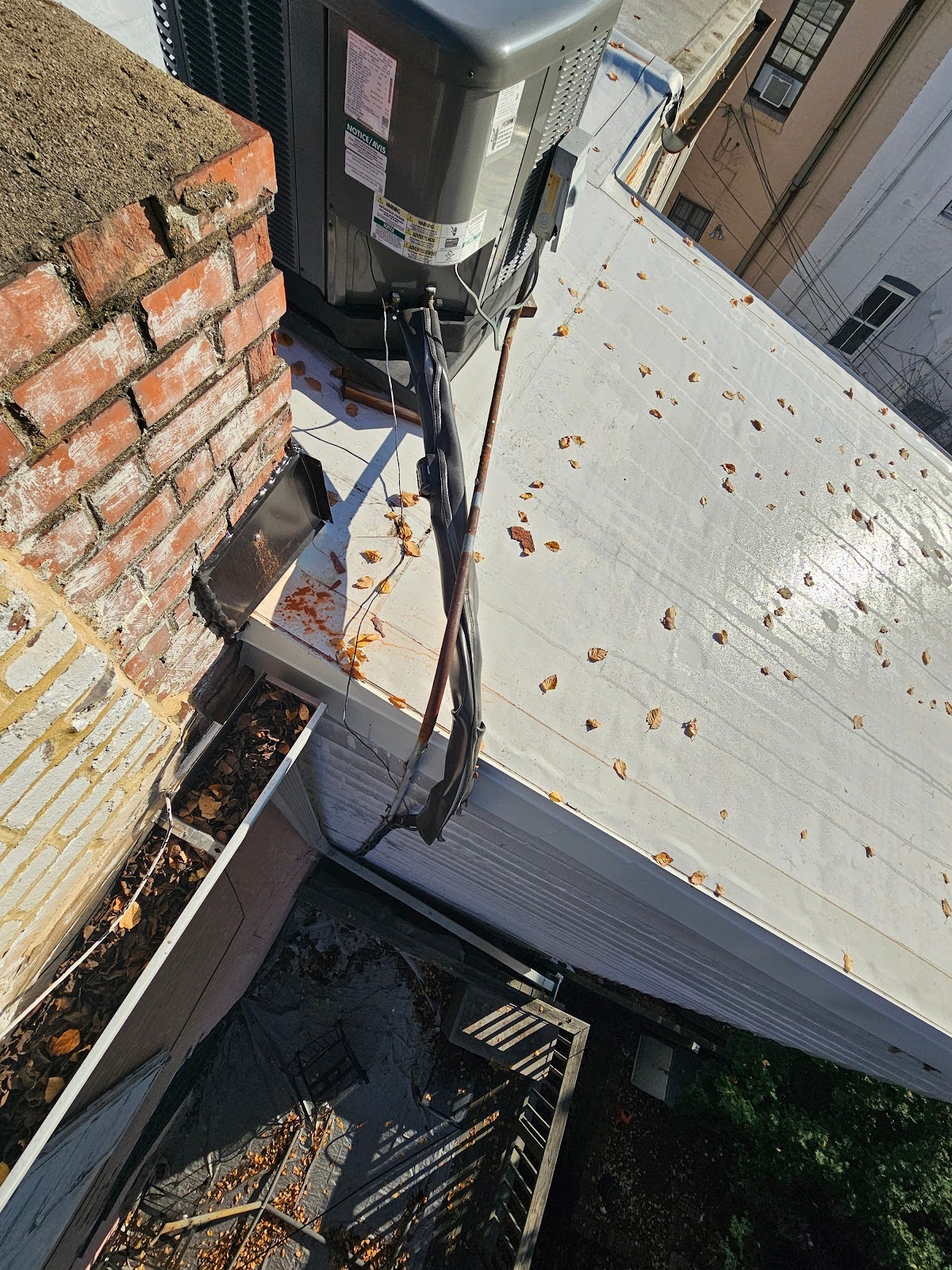 Unsafe power cabling dangled near residential roof