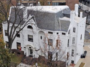 Home 16 Variety of roof types visible on a single building structure