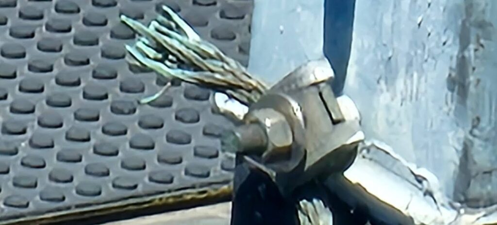 frayed portion of the braided copper conductors