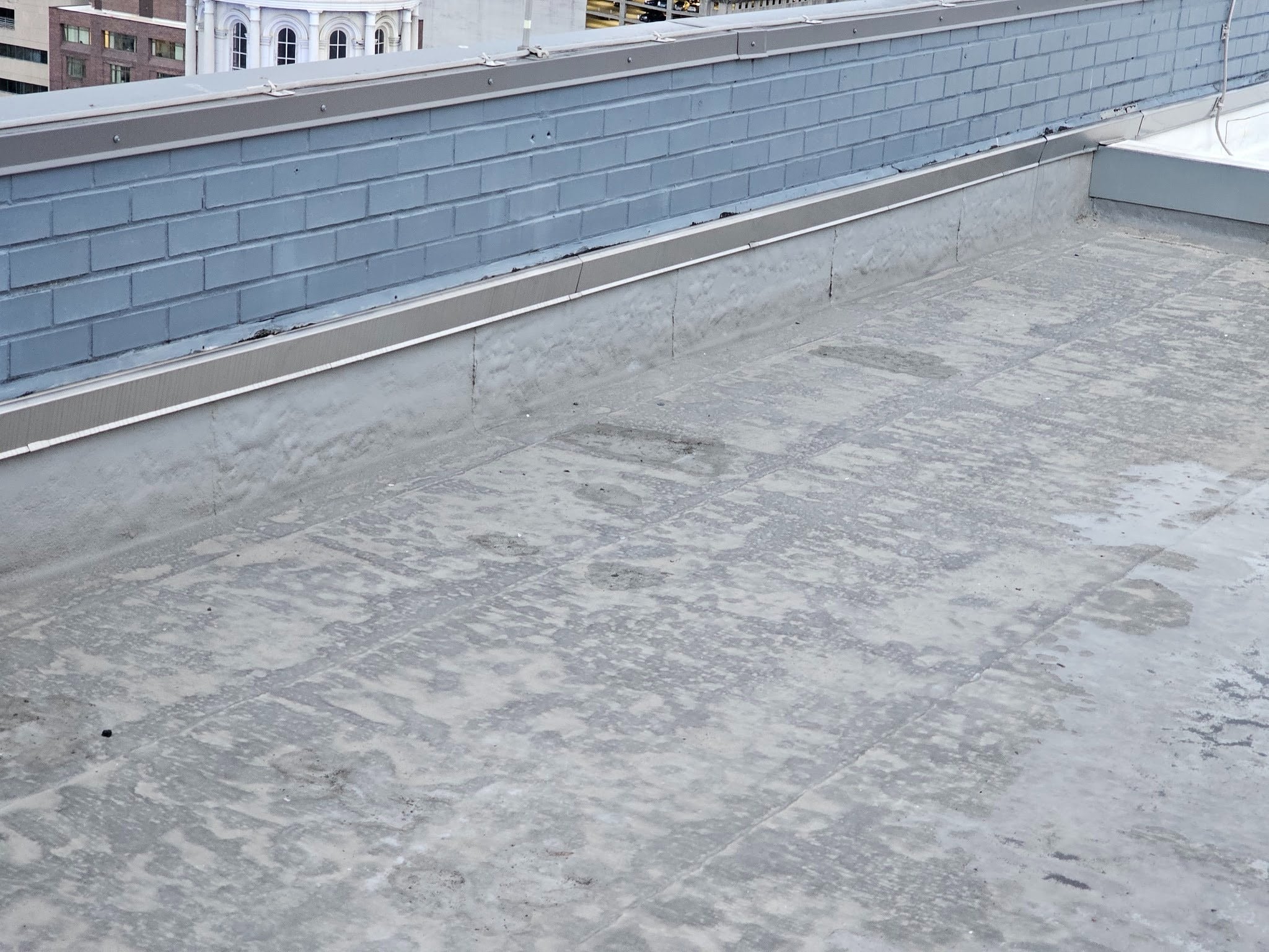 Counterflashing installed on a pop-up roof to prevent water intrusion