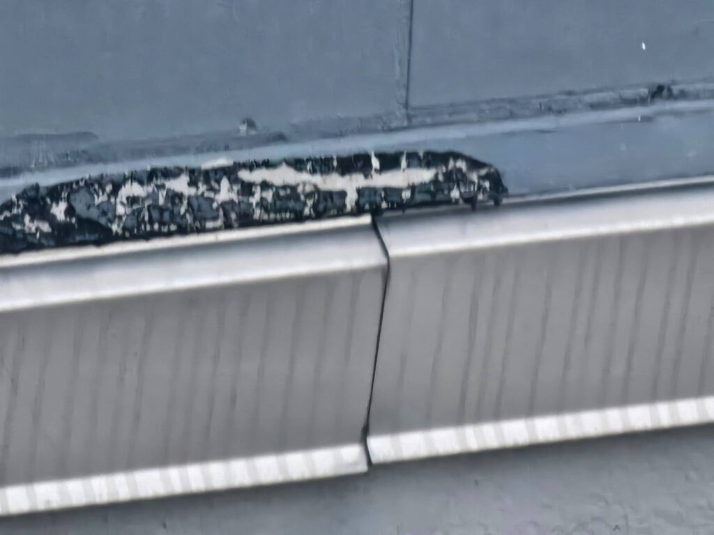 Counterflashing on Pop-Up Roofs 3 Professional roofing counterflashing on a pop-up roof for weather protection
