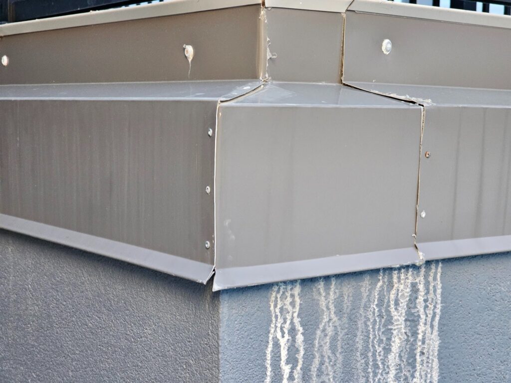 Counterflashing on Pop-Up Roofs 5 Roof inspection showing counterflashing detail on a pop-up roof transition