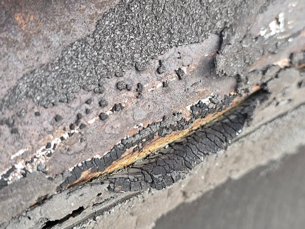 Skylight leak damage requiring roof rebuild and replacement