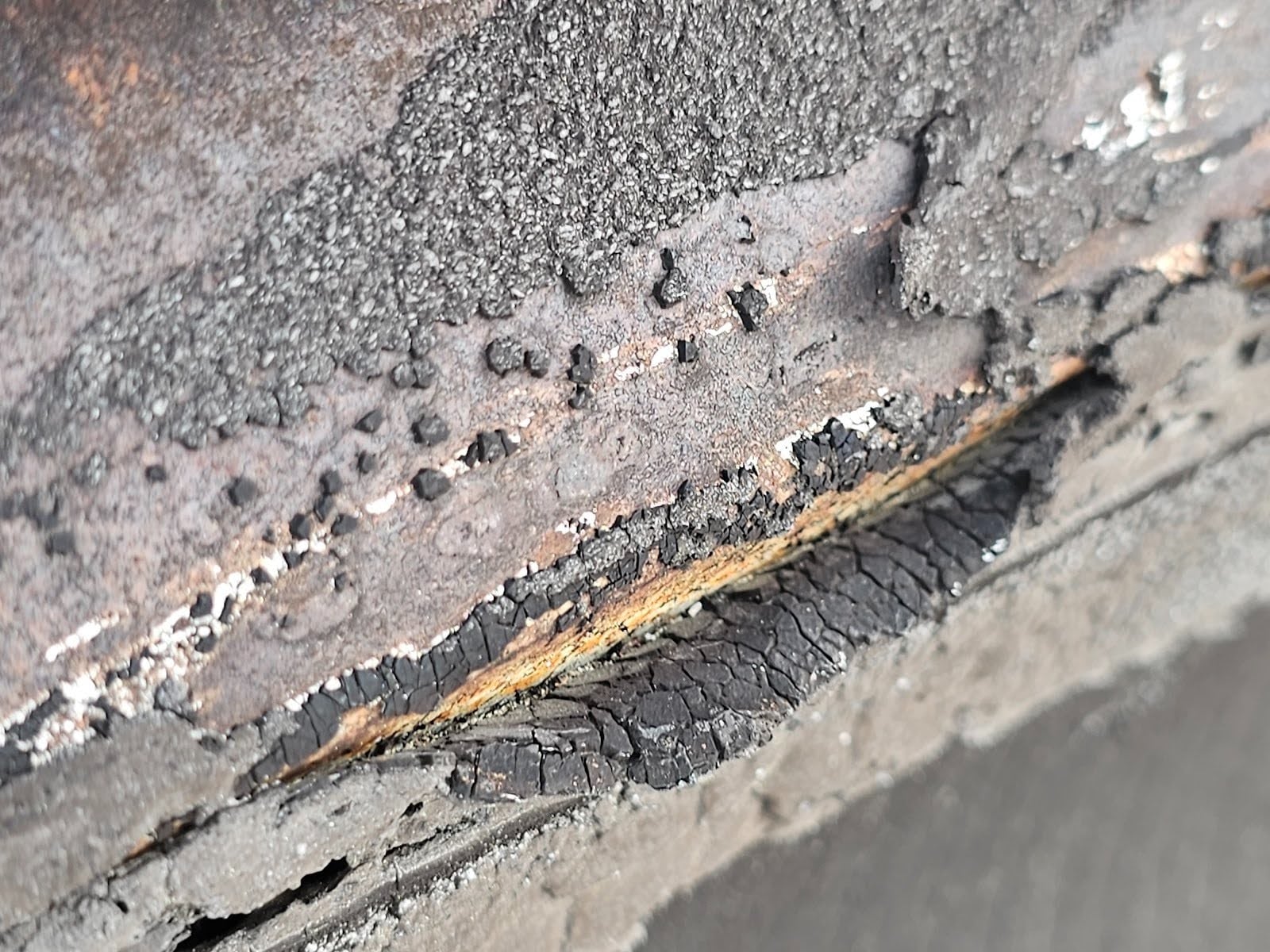 Skylight leak damage requiring roof rebuild and replacement