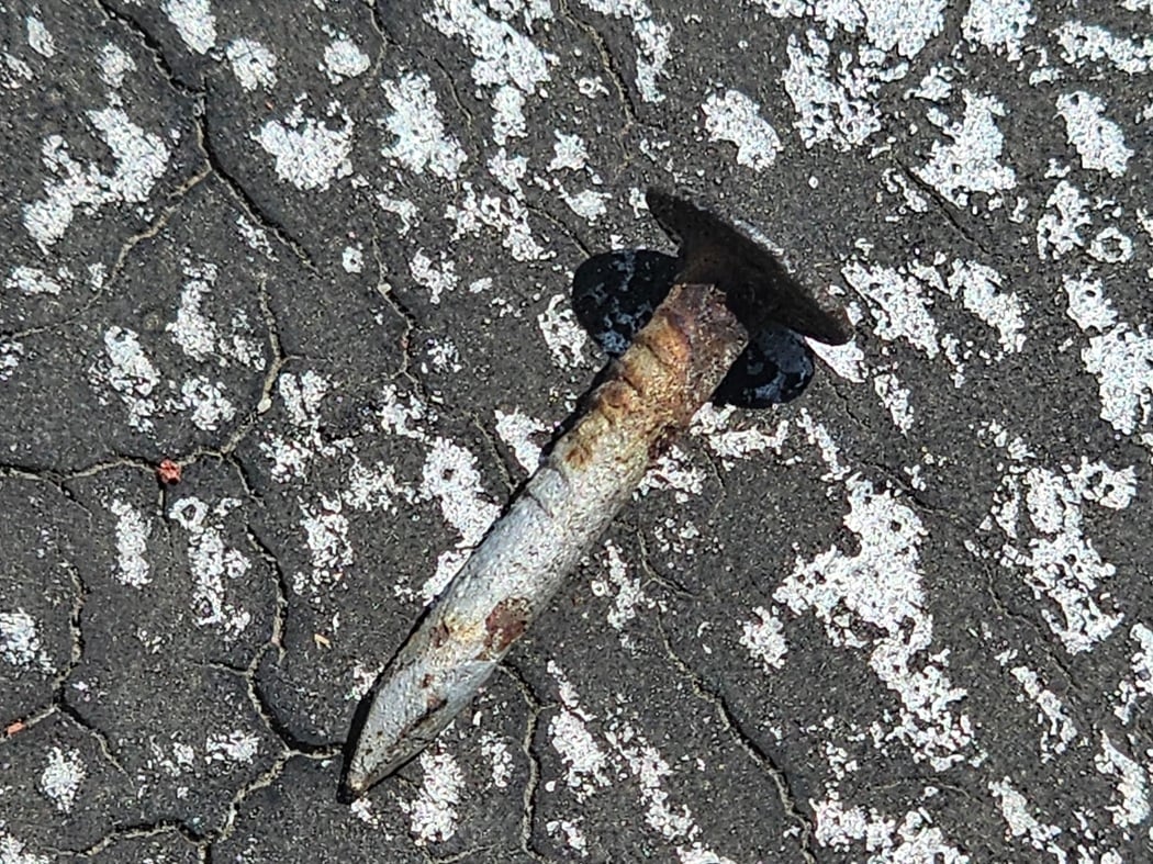 Nail Pop Through a Modbit Roof 5 Loose roofing nail left by contractor on DC flat roof