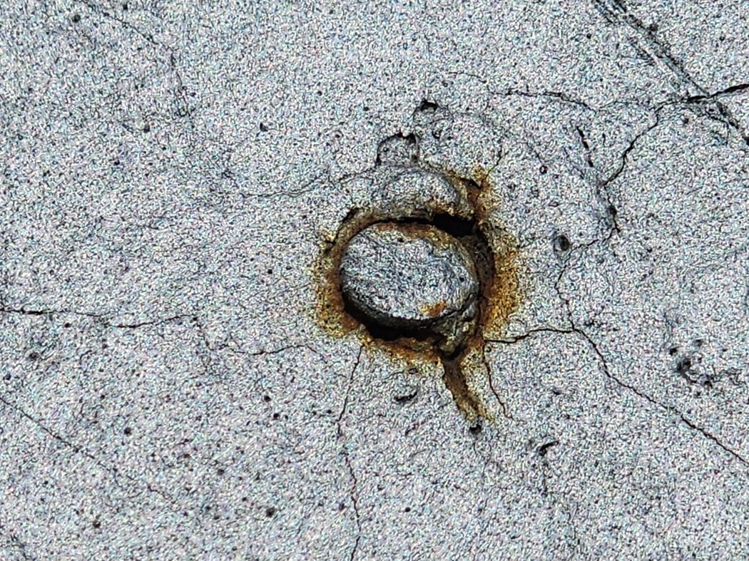 Nail Pop Through a Modbit Roof 3 Nail pop with rust oxidation ring through modified bitumen roof, DC